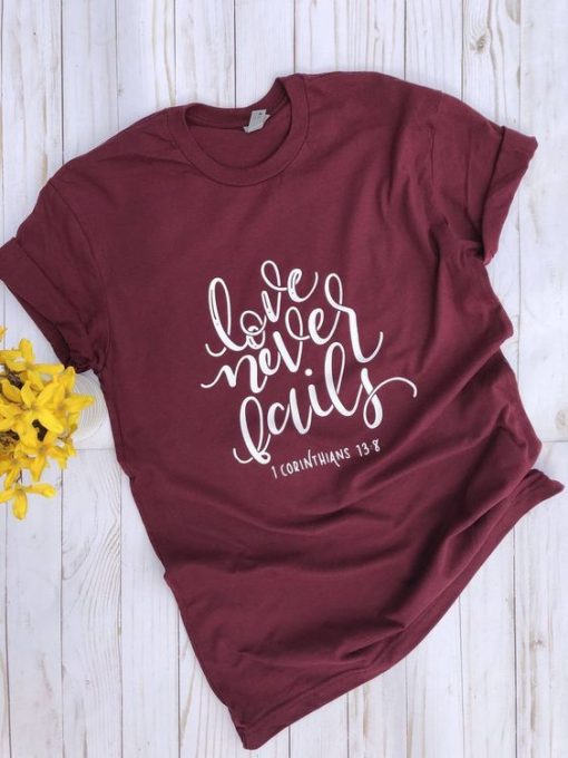 LOVE NEVER FAILS T-Shirt AV01